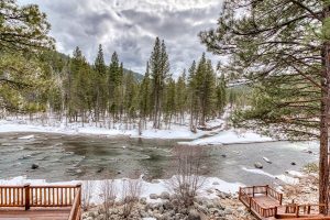 Enjoy fly fishing right outside your door at this Western Montana luxury home at West Fork!